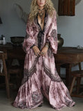 Vestido largo tipo bata con cinturón y estampado de rosas y motivos cachemir en rosa