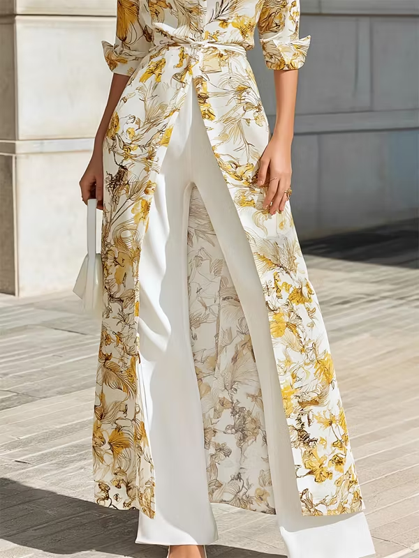 Conjunto de camisa larga con estampado floral dorado y pantalón blanco de corte ancho